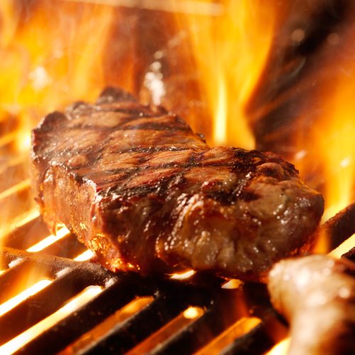 Beef,Steak,On,The,Grill,With,Flames.